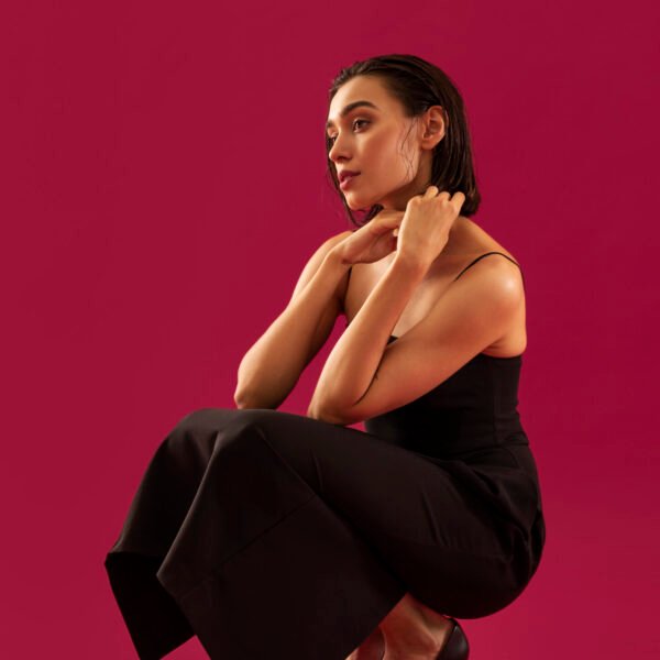 full-shot-woman-wearing-black-dress